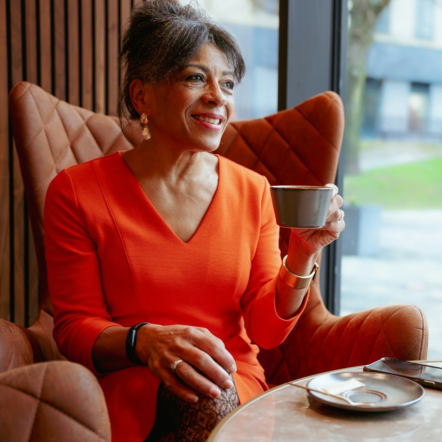 Woman with a cup of coffee in a café