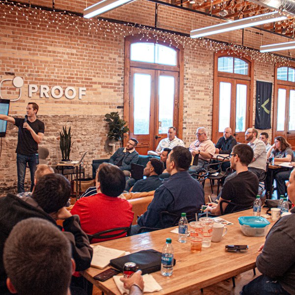A presenter speaking to a group