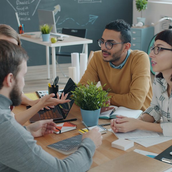 Group talking round a table